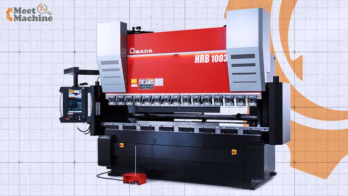 Used Amada HG-1003 servo-hydraulic CNC press brake, a 110-ton machine with a 118-inch bending length and AMNC 3i control, on a sheet metal fabrication floor. Featured in the Resell CNC Meet the Machine guide on specs, the HG family, used pricing, and inspection.
